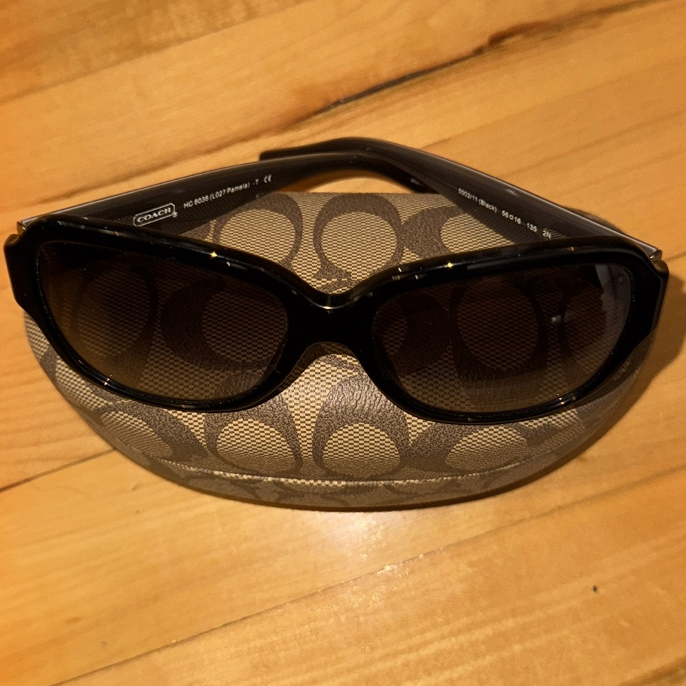 Coach women’s sunglasses and hard case! Barely worn in exceptional condition!